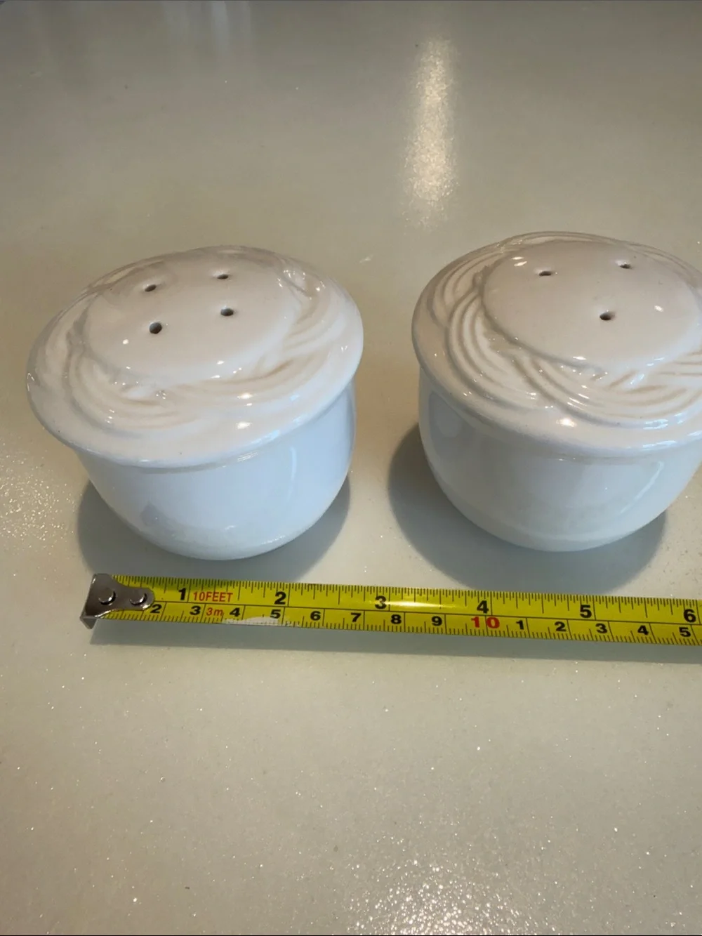 White Pfaltzgraff Ceramic Salt and Pepper Shakers - Swirl Detail